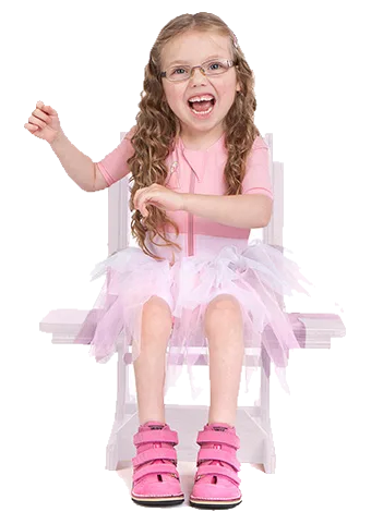 SDO-Suit-pink-sitting-girl-with-lightened-chair-portrait-website